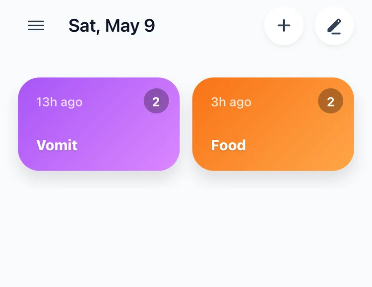 The TapDiary home screen with a vomit button and a food button, each carrying today's count and the time since the last record